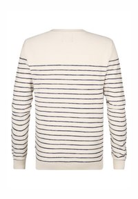 Gestreepte trui in crème en marineblauw. Heeft een ronde halslijn, ribgebreide manchetten en horizontale strepen over het hele lijf en de mouwen.