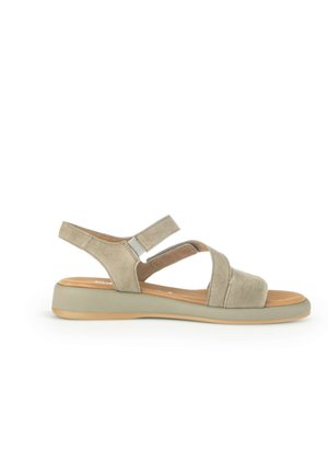 Sandale à bout ouvert en daim beige avec bride de cheville réglable et semelle coussinée, conçue pour un usage décontracté.