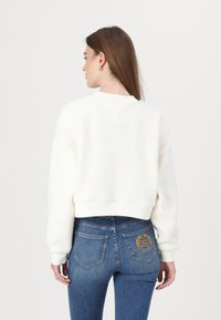 Tommy Jeans Fliisdžemper - ancient white