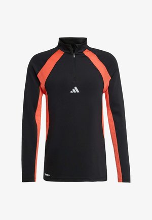 Black long-sleeve athletic top with orange raglan sleeves and a high collar. Features a front zipper and a white Adidas logo on the chest.