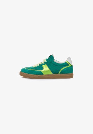 Green suede sneaker with lime green accents, perforated detailing, white heel cap, and a brown rubber sole. Features light green laces.