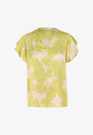 Bluză cu mânecă scurtă în bej deschis, cu un model tropical cu frunze verzi. Dispune de un decolteu în V și un material moale, neted, cu o croială lejeră.