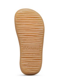 Podešev boty s horizontálními drážkami, velikost 20 vyražená blízko paty, a název značky "Naturino" vyražený uprostřed.