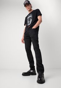 HUGO 734 - Housut - black