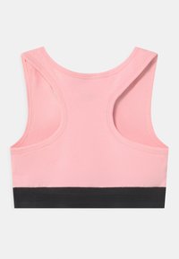 Rosa sportbh med rund hals, breda ärmhål och en svart texturerad band i botten. Slät tyg, inga mönster eller dekorationer.
