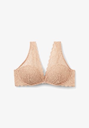 Spitzen-BH in einem sanften Nude-Ton mit gewelltem Design, Bügelunterstützung und floralen Mustern sowie einer kleinen Schleife in der Mitte.