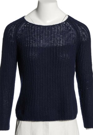 Pull bleu marine à manches longues tricoté avec un motif de tissage lâche présenté sur un torse de mannequin blanc.