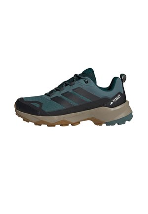 Trail running shoes with a teal and black textile upper, featuring three black stripes, a cushioned beige midsole, and rugged brown outsole.