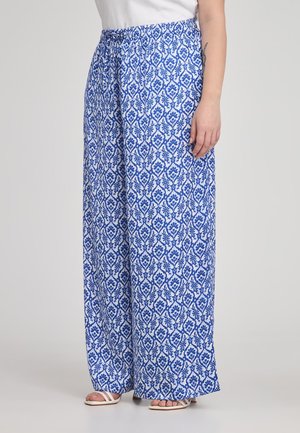 Pantaloni a palazzo blu e bianchi con un elastico in vita e un design floreale, realizzati in tessuto leggero, adatti per il clima caldo.