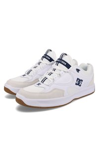 White athletic shoes featuring a combination of leather and mesh materials. Accented with navy blue branding and a rubber sole.