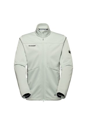 Giacca softshell grigia chiara con colletto alto, chiusura a zip, due tasche frontali e dettaglio del logo. Realizzata in un materiale liscio ed elastico.