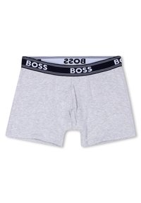 Γκρι βαμβακερά μπόξερ με μαύρη και λευκή ζώνη με λογότυπο. Διαθέτουν μπροστινό άνοιγμα και εφαρμοστή γραμμή, με επίπεδες ραφές για άνεση.