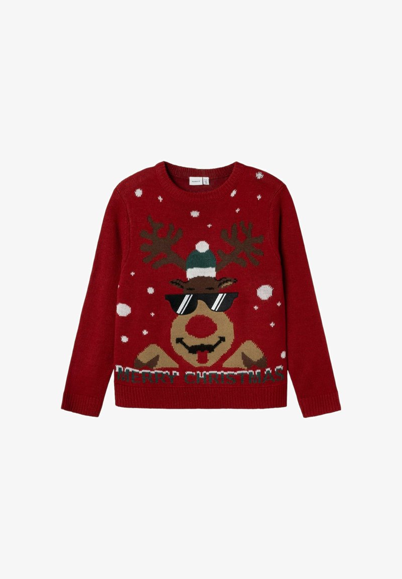 Maglione rosso lavorato a maglia con un renna che indossa occhiali da sole e un cappello verde, circondata da fiocchi di neve bianchi e la scritta "BUON NATALE".