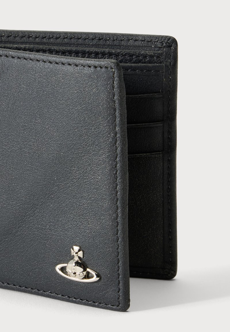 Black leather bifold wallet with silver orb and cross emblem on front, showing multiple card slots inside.