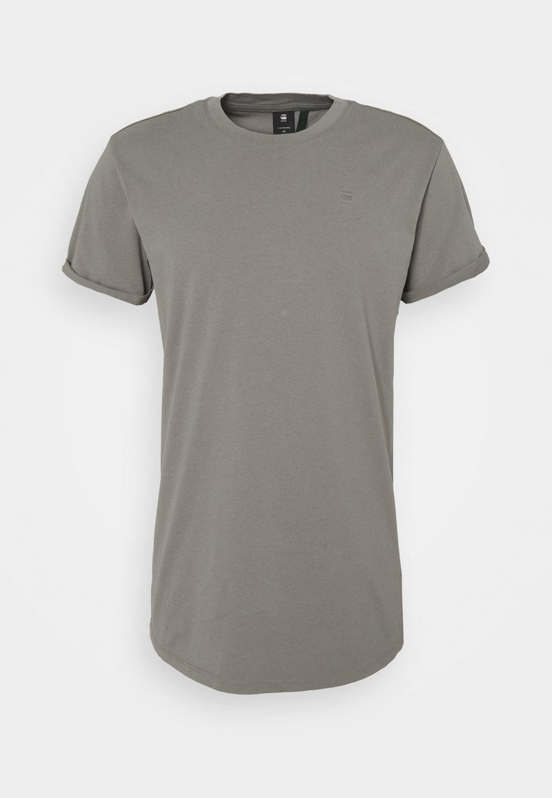 Grå bomulds t-shirt med korte, rullede ærmer, rund halsudskæring og lige kant. Har minimal branding på brystet.