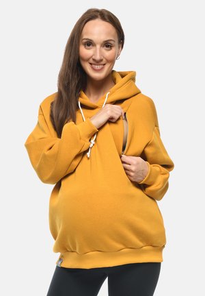 Gelbe Kapuzenjacke mit Frontreißverschluss, Kordelzugkapuze und gerippten Bündchen. Entworfen für Komfort, mit bequemer Passform und weichem Material.