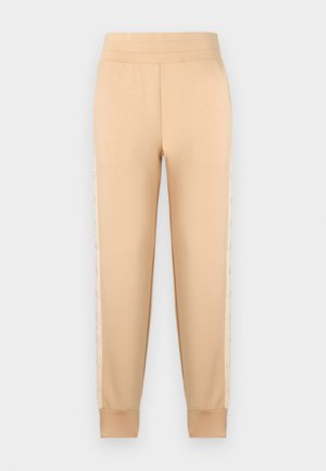 Beige Sweatpants mit glatter Textur, im taillierten Design, mit elastischem Bund und gemusterten Seitenpaneelen.