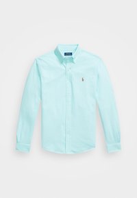 Světle modrá košile s dlouhým rukávem a knoflíkovým límcem, malým vyšívaným logem polo hráče na levé hrudi a bílými knoflíky.