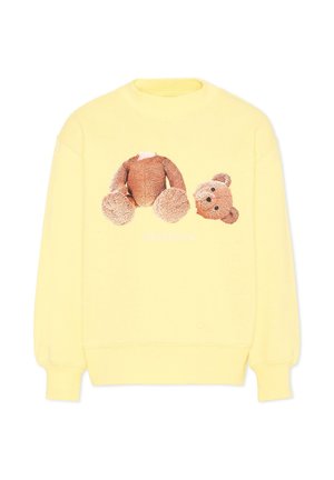 Geel sweatshirt met een afbeelding van een bruine teddybeer waarvan het hoofd en het lichaam op de voorkant gescheiden zijn.