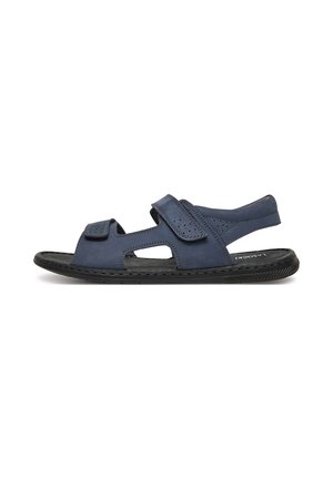 Niebieskie skórzane sandały o otwartym kroju, z regulowanymi rzemykami na rzepy i czarną gumową podeszwą, z perforowanymi detalami na cholewce.