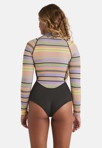Long-sleeve swimsuit featuring pastel horizontal stripes with purple, orange, and green colors. Black bottom with smooth texture and high waist.