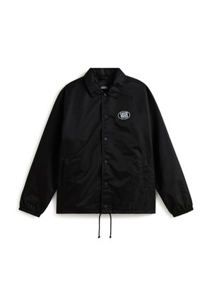 Czarna, lekka kurtka z kołnierzykiem, zatrzaskami, elastycznymi mankietami, bocznymi kieszeniami i logo Vans na piersi. Ściągacz na dole.