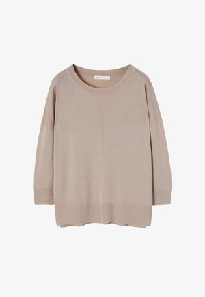 Cream-colored, loose-fitting sweater with a round neckline, dropped shoulders, and ribbed cuffs. Soft fabric with minimal seams and no patterns.