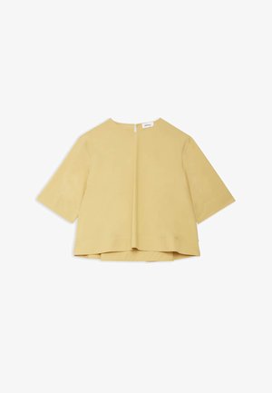Blouse jaune moutarde à manches courtes pour femme, à coupe ample, avec un col rond et une fermeture boutonnée au dos.
