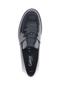Black patent leather loafer shoe with a smooth finish, rounded toe, and visible stitching detail. Features a cushioned insole for comfort.