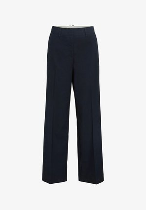 Pantalon sur mesure bleu marine avec un design à jambe droite, comprenant des plis sur le devant, une fermeture éclair et une finition à texture lisse.