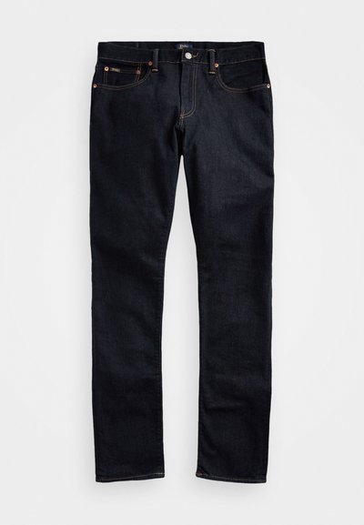 Jeans din denim de culoare închisă, cu croială dreaptă; caracteristici: nituri din cupru, cusături în contrast, cinci buzunare și fermoar cu închidere pe bază de buton.