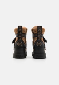 Buffalo ASPHA COM1 WARM - Botas para la nieve - black/brown