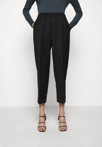 Filippa K Tygbyxor - black