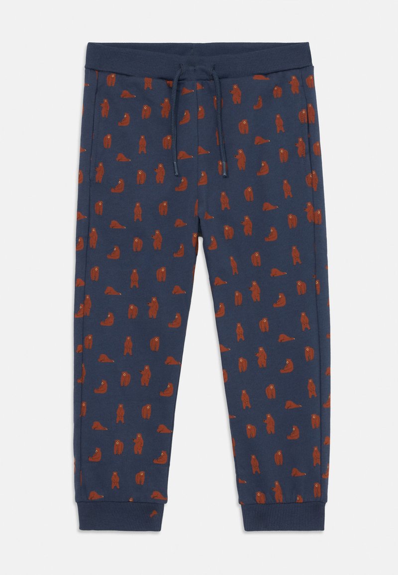 Marineblauwe joggers met een patroon van bruine beren, gemaakt van zachte stof met een elastische tailleband en boorden, en een trekkoord voor een verstelbare pasvorm.