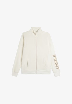 Giacca con zip color avorio con colletto alto, tasche frontali e la scritta "BRODY TIME TO SHINE" sulla manica sinistra in lettere dorate.