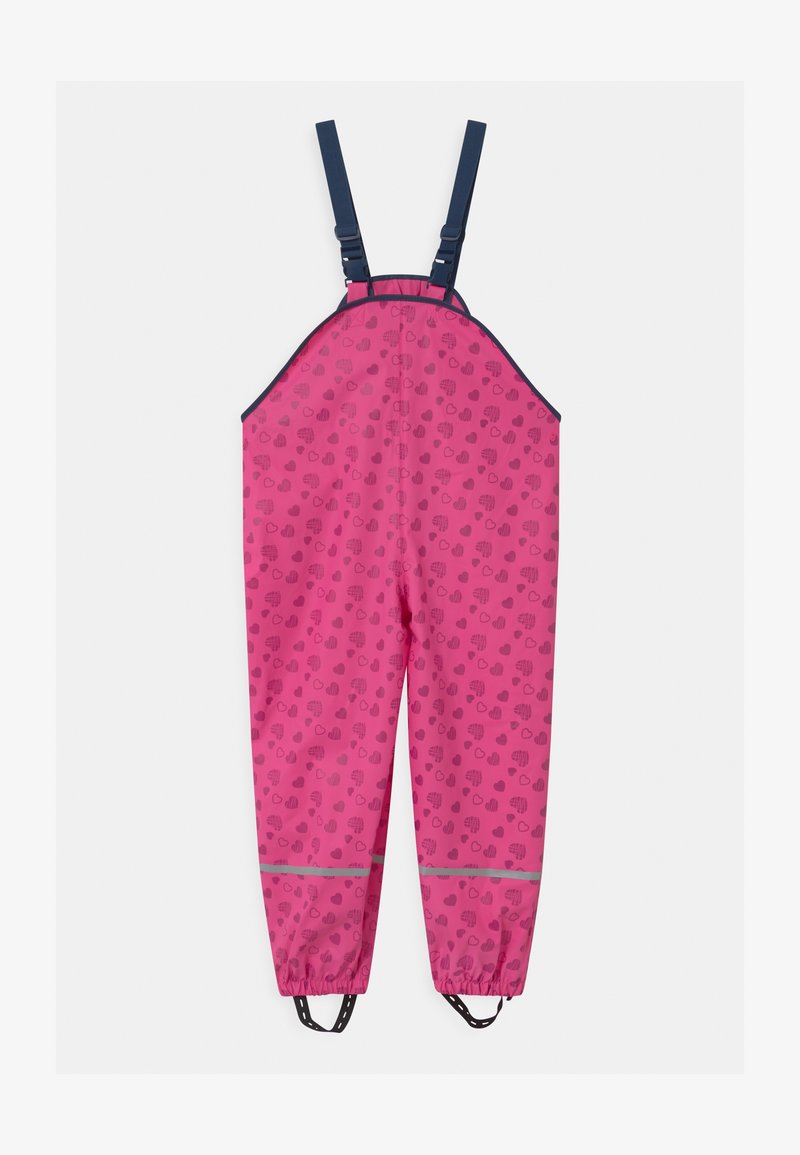 Růžový nepromokavý overal s vzorem srdcí, nastavitelné námořnické popruhy, elastické manžety a reflexní prvky na kotnících.