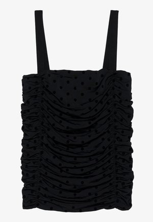 Schwarzes Top mit verstellbaren Trägern, das eine geraffte Textur und ein erhabenes Punkte-Muster aufweist. Weicher Stoff mit einer taillierten Passform.
