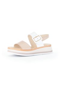 Beige and white sandal with a wide strap, adjustable buckle, and platform sole. Upper in smooth leather, cushioned footbed, textured rubber outsole.