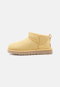 Niewybrane, muted mustard
