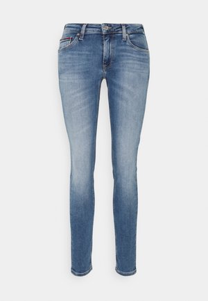 Blue slim-fit denim jeans with front button and zip closure, front pockets, and subtle faded detailing.
