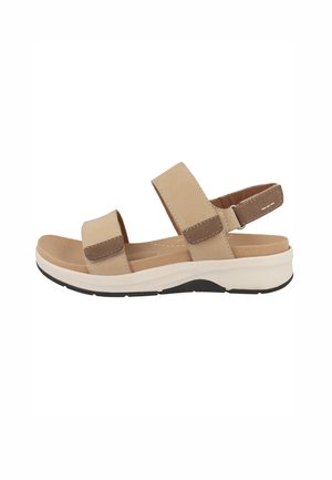Sandalo beige con punta aperta con due cinturini regolabili sul piede e sulla caviglia, suola imbottita e suola esterna nera zigrinata.