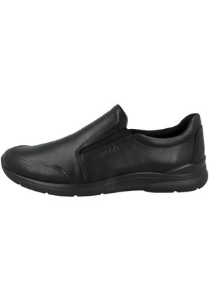Black slip-on shoe made of smooth leather, featuring elastic side panels, round toe, and a textured rubber sole for grip.