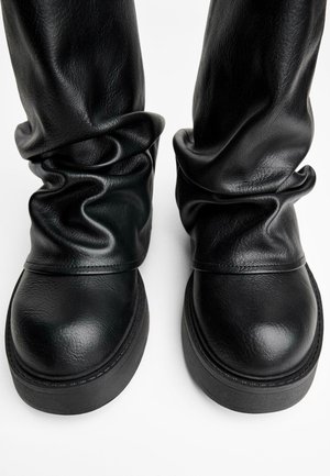 Botines camperos - black