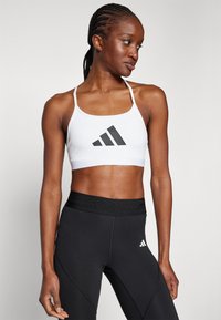 adidas Performance AEROREACT BIG GRAPHIC - Lengvai krūtinę prilaikanti sportinė liemenėlė - white