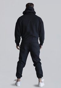 SIKSILK JOGGERS - Tracksuit bottoms - black