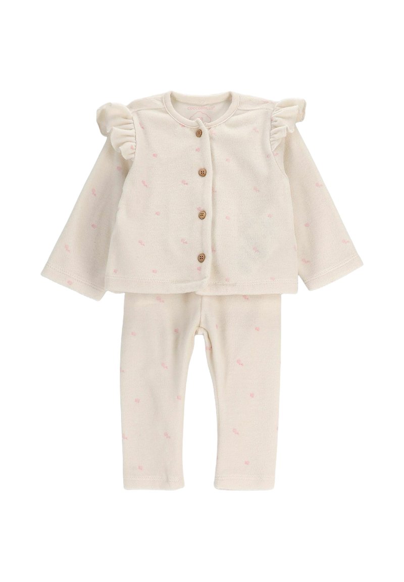 Kremowy strój dla niemowląt z długimi rękawami, brązowymi guzikami, falbaniastymi ramionami oraz małym różowym wzorem kropek, w komplecie ze spodniami.
