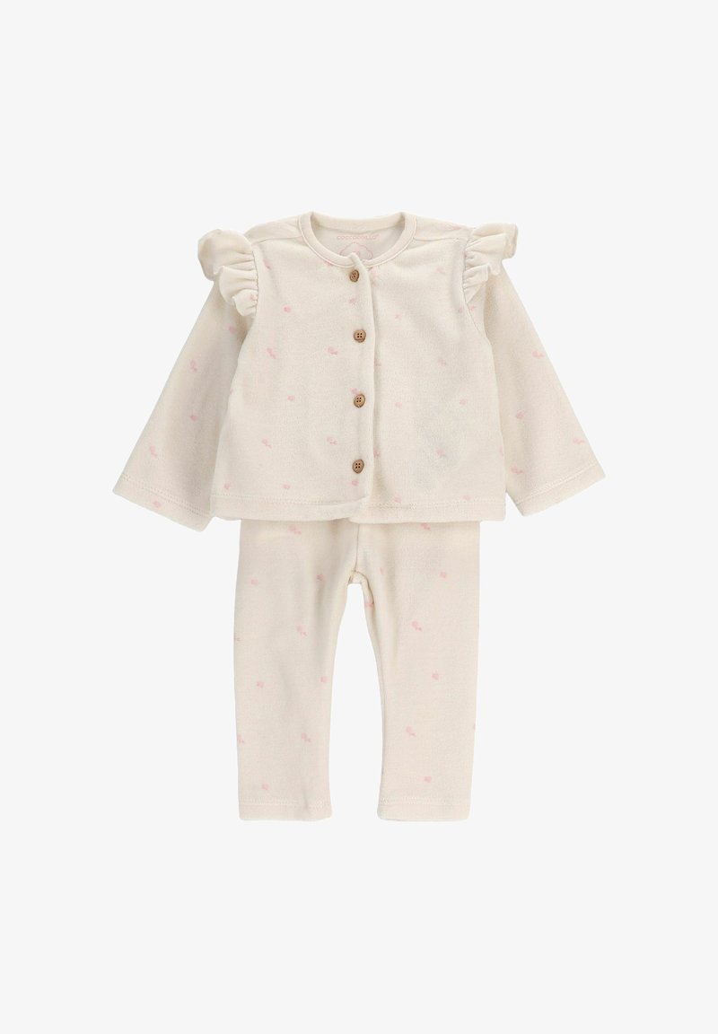 Kremowy strój dla niemowląt z długimi rękawami, brązowymi guzikami, falbaniastymi ramionami oraz małym różowym wzorem kropek, w komplecie ze spodniami.