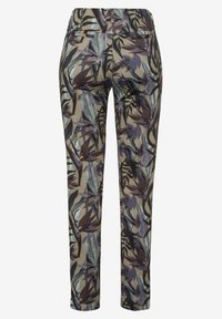 Pantalon ajusté à taille haute, orné d'un motif de feuilles superposées aux tons verts pâles, bruns et violets.