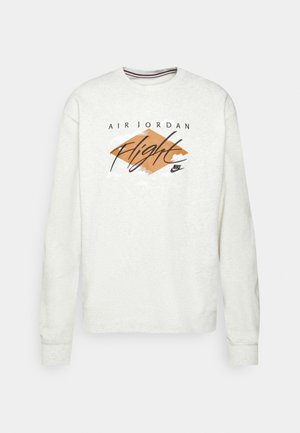 Sweat-shirt blanc à manches longues et col rond avec le texte "Air Jordan Flight" et le logo Nike sur une forme losange orange au centre devant.