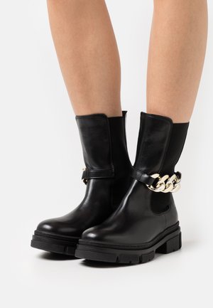 Platform ankle boots - black/gold